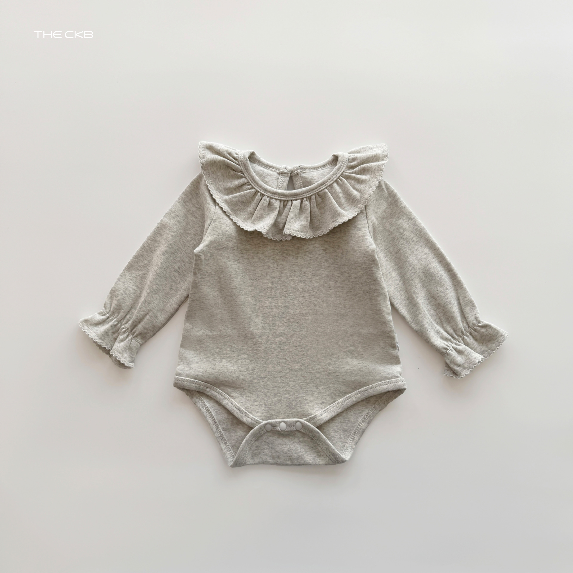 ナチュラルフリル ロンパース