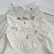 ナチュラルフリル ロンパース