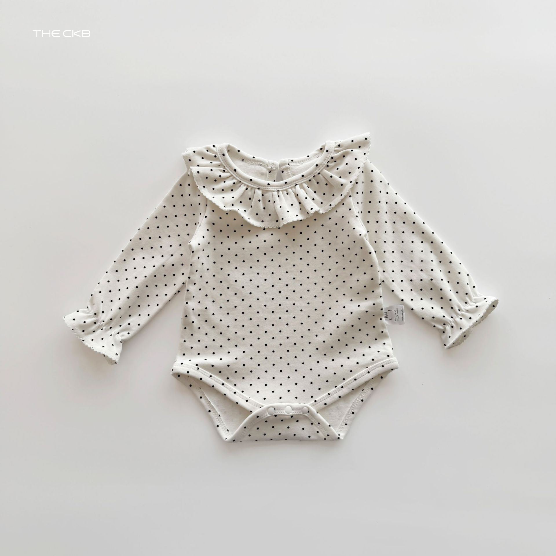 ナチュラルフリル ロンパース