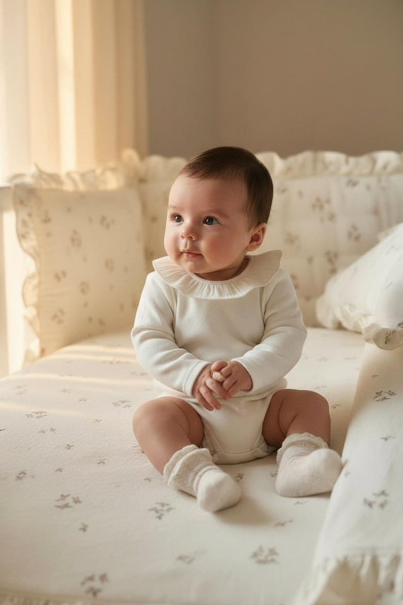 ナチュラルフリル ロンパース