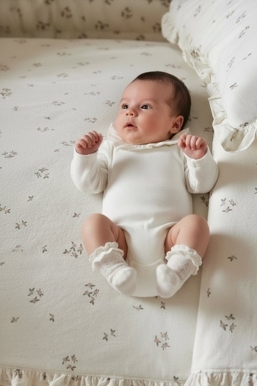 ナチュラルフリル ロンパース